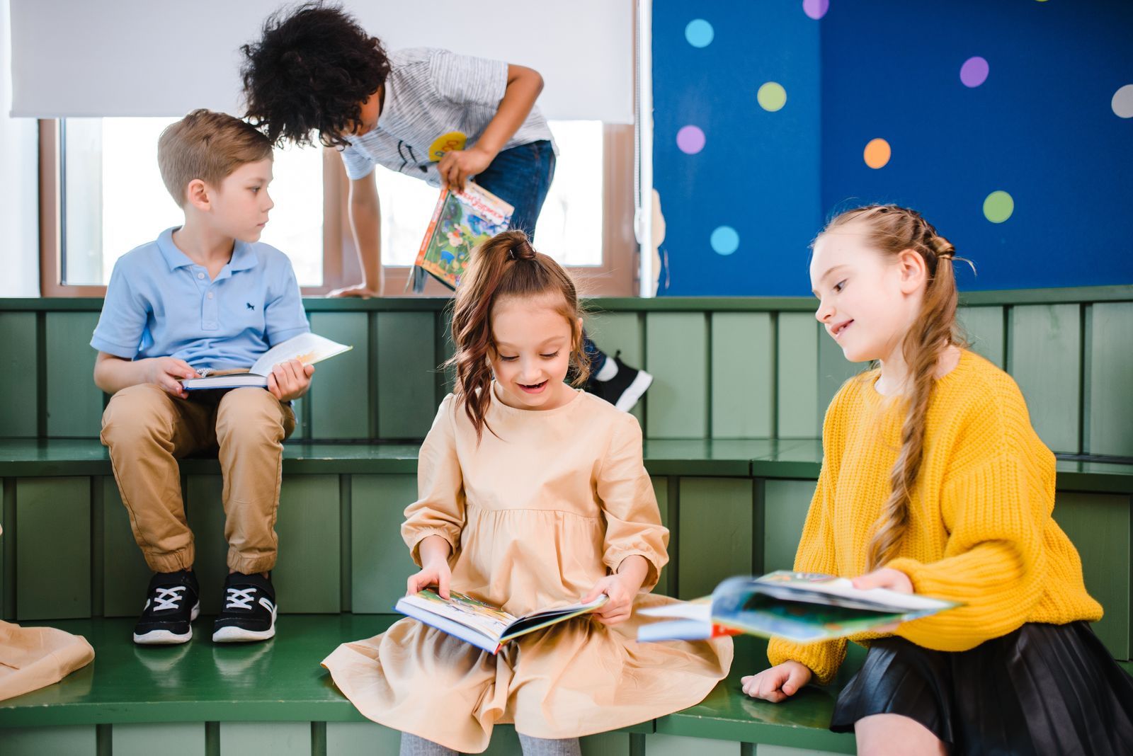 Children reading together at a Brightmind holiday session